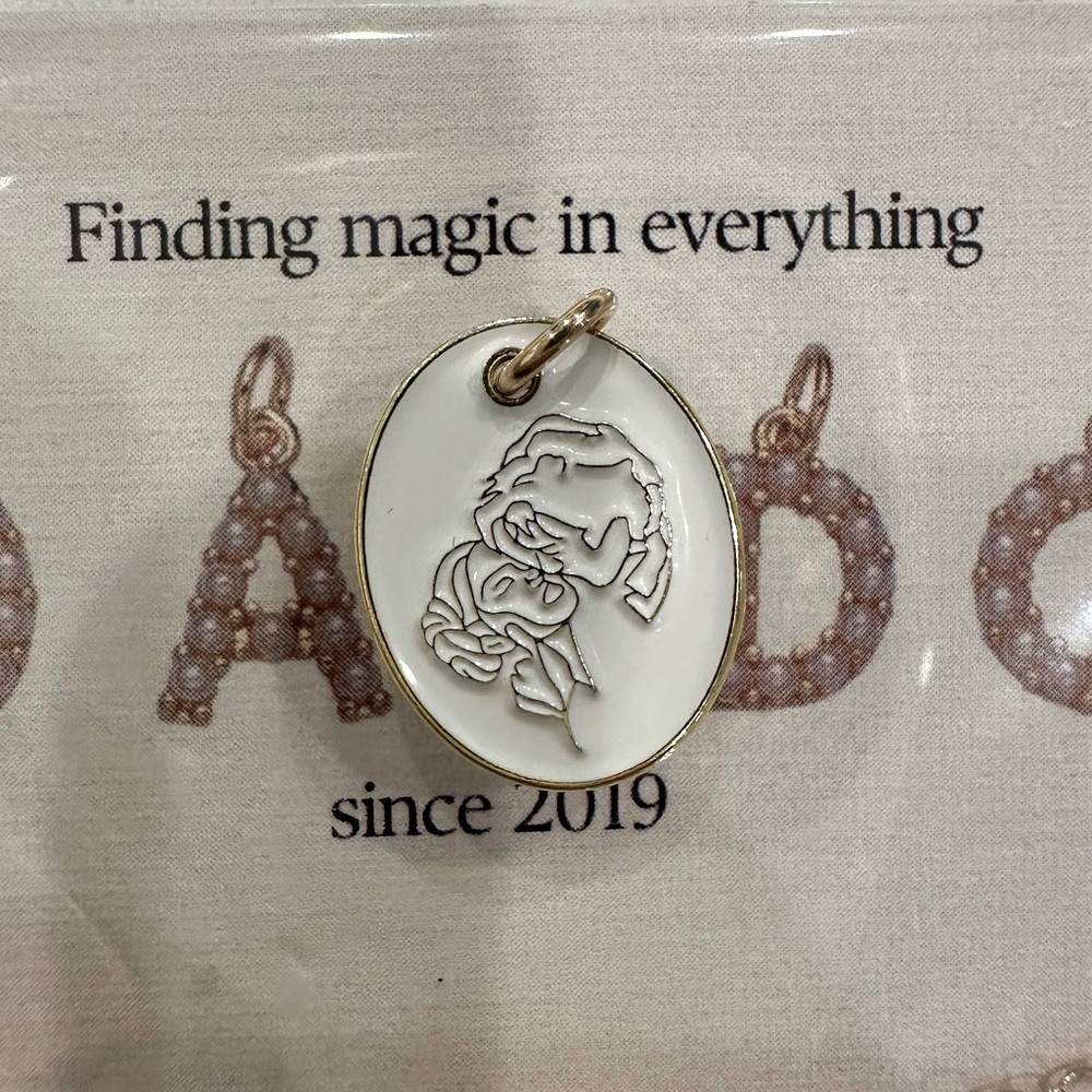 Jo and co goods gold filled Han and Leia pendant